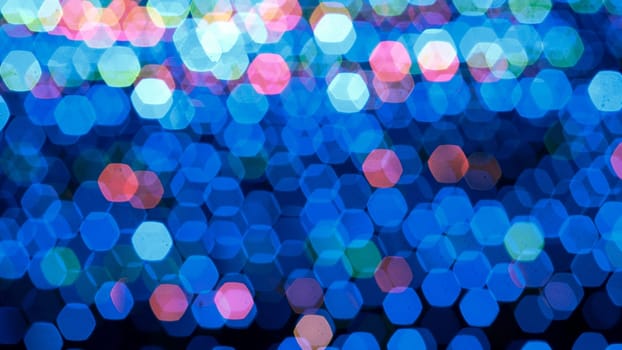 Abstract colorful bokeh light on dark background. Christmas and New Year theme