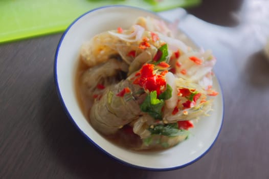 Raw mantis shrimp dressing spicy and sour fish sauce  . THAI food