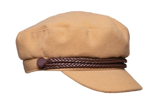 Closeup of a female fashionable beige or light brown hat or cap with visor isolated on a white background. Macro.