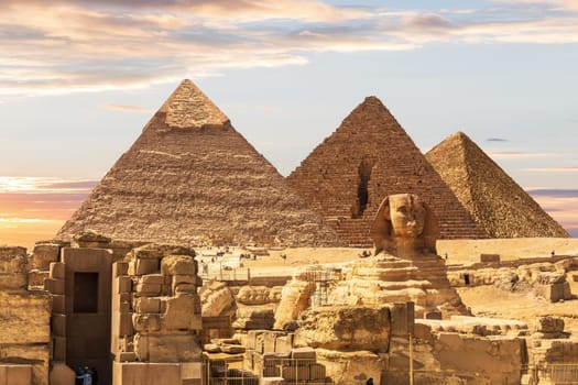 Ruins of Egypt Necropolis with the Sphinx by the Pyramids, Cairo, Egypt.