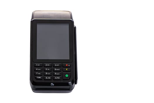 black payment terminal close-up for accepting money from plastic cards from customers on a white isolated background, copy space. High quality photo