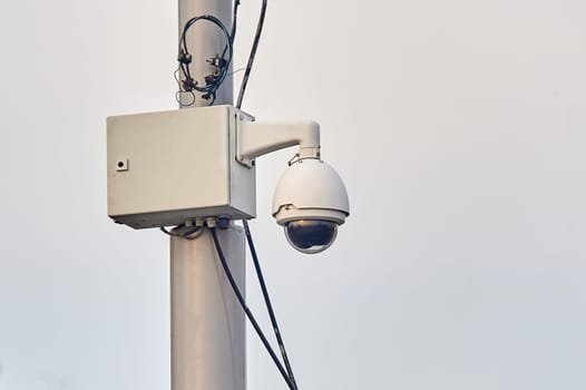video surveillance camera mounted on a pole. High quality photo