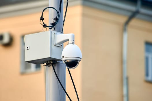 video surveillance camera mounted on a pole. High quality photo