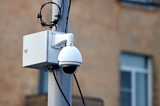 video surveillance camera mounted on a pole. High quality photo