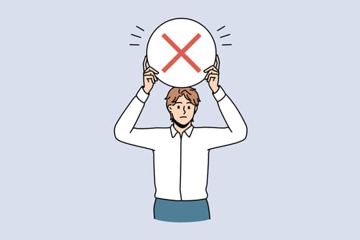 Stop and reject sign concept. Young frustrated serious man worker standing holding round red rejecting denying stop sign in hands vector illustration