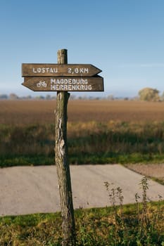 Signpost on the popular Elbe cycle path between the city of Magdeburg and the village of Lostau in Germany