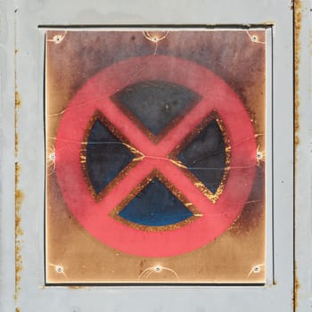 No stopping sign at the gate of a garage in the town of Krk in Croatia