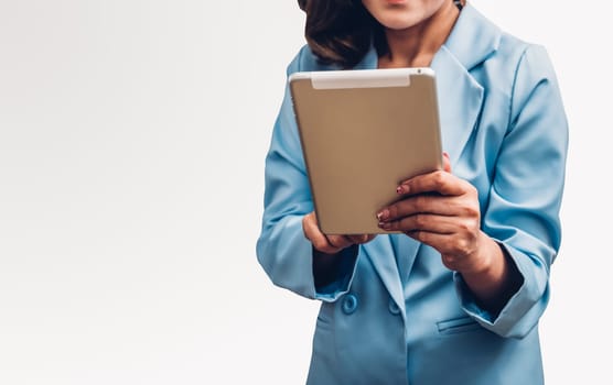 Young business woman holding digital technology tablet computer on her hand isolated white background