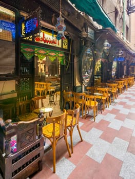 Cairo, Egypt- September 25 2021: Old famous coffeehouse, El Fishawi, located in historic Mamluk era Khan al-Khalili famous bazaar and souq
