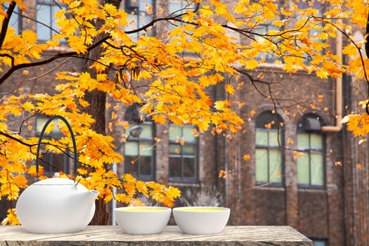 The 3d rendering of Cup with tea and teapot with nice background