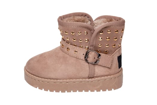 Childrens winter boots. Close-up of two pairs elegant brown suede leather winter boots lined with fur. Girls winter shoe fashion newest trends isolated on a white background. Macro photograph.