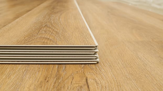 Click vinyl flooring to install yourself in the living room of an apartment