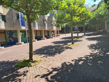 Neviges District, Velbert City, Germany - March 2019: Outdoor sunny view of Mariendom, landmark and famous church with massy concrete brutalism architectural style was designed by Gottfried Böhm.