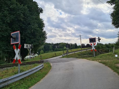 Unrestricted level crossing Andreaskreuz with country road