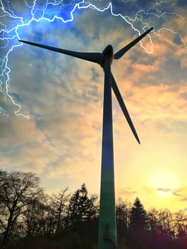 Wind turbine in the countryside during a thunderstorm and storm, rainy sky, bad weather