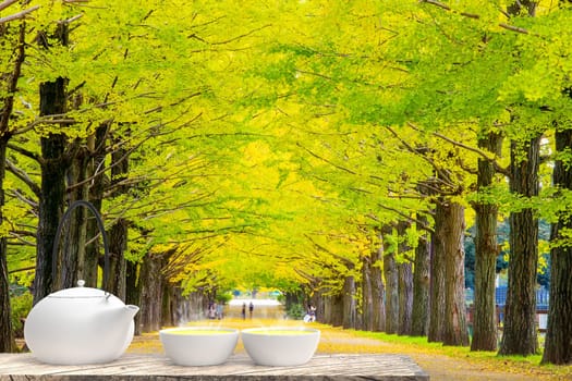 The 3d rendering of Cup with tea and teapot with nice background