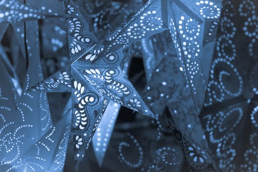 Beautiful shiny star mood lamp in merry advent decoration. Traditional symbol of the best miracle time of the year. Part of series.