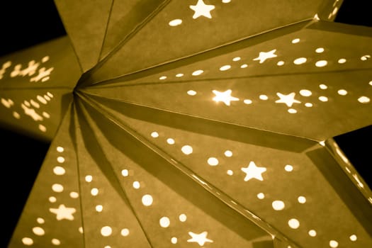 Beautiful shiny star mood lamp is merry advent decoration. Traditional symbol of the best miracle time of the year. Part of series.