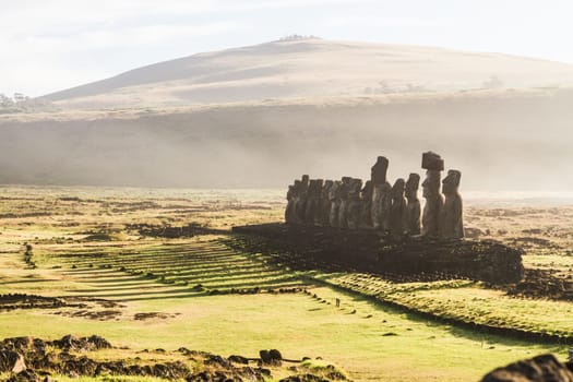 Sunrise over Moai stone sculptures at Ahu Tongariki, Easter island, Chile