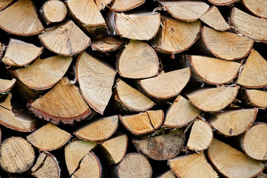 firewood stacked in a pile closeup