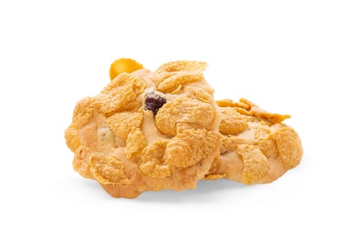 Cornflakes butter cookies with raisins and almonds isolated on white background