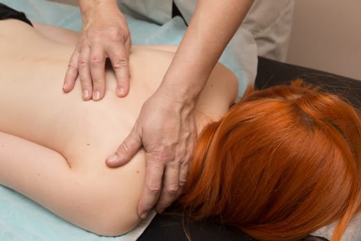 Tired worried man enjoying therapeutic massage