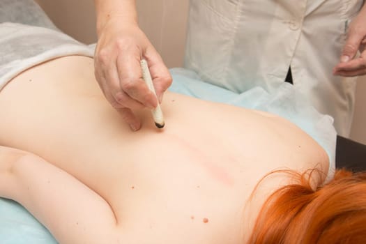 Tired worried man enjoying therapeutic massage