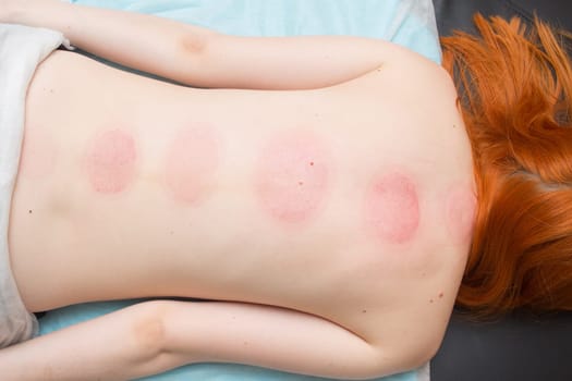 Tired worried man enjoying therapeutic massage