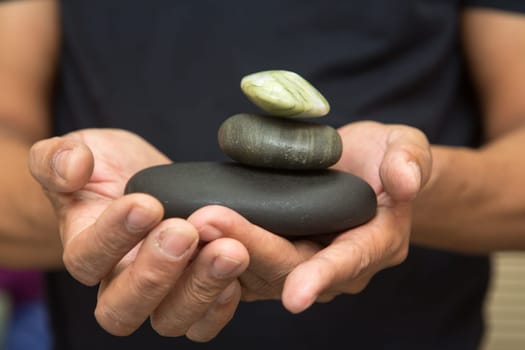 stones for stone therapy in the hands.