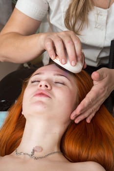 Tired worried man enjoying therapeutic massage
