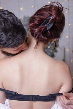 Pure passion.A man hugs and kisses a woman.