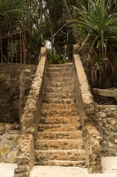 Stone steps leading up to the beach. Stand, Zanzibar Urban West, Tanzania.