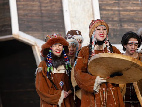 PETROPAVLOVSK, KAMCHATKA, RUSSIA - DECEMBER 24, 2021: Folk ensemble performance in dress of indigenous people of Kamchatka. The holiday Northern aboriginal Koryak
