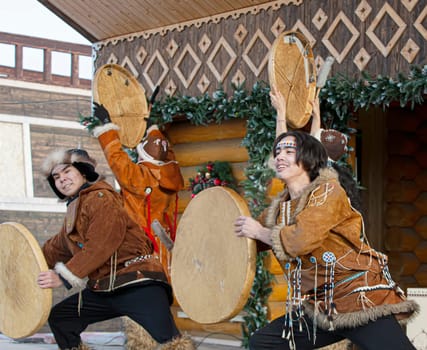 PETROPAVLOVSK, KAMCHATKA, RUSSIA - DECEMBER 24, 2021: Folk ensemble performance in dress of indigenous people of Kamchatka. The holiday Northern aboriginal Koryak