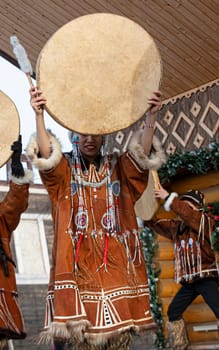 Folk ensemble performance in dress of indigenous people of Kamchatka. The holiday Northern aboriginal Koryak