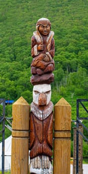 The wooden idol statue of koryak on Kamchatka peninsula