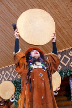 PETROPAVLOVSK, KAMCHATKA, RUSSIA - DECEMBER 24, 2021: Folk ensemble performance in dress of indigenous people of Kamchatka. The holiday Northern aboriginal Koryak