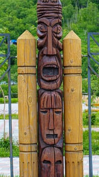 The wooden idol statue of koryak on Kamchatka peninsula