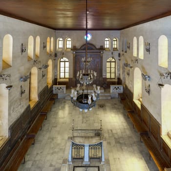From above interior view of historic Jewish Maimonides Synagogue or Rav Moshe Synagogue with arched windows and chandelier in Gamalia district, Cairo Egypt