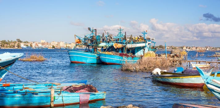 A beautiful shot in a harbor with blue ships