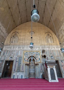 Day shot Monumental main Iwan of Mamluk era historical public Mosque and Madrasa of Sultan Hassan, Old Cairo