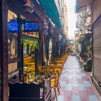 Cairo, Egypt- September 25 2021: Old famous coffeehouse, El Fishawi, located in historic Mamluk era Khan al-Khalili famous bazaar and souq
