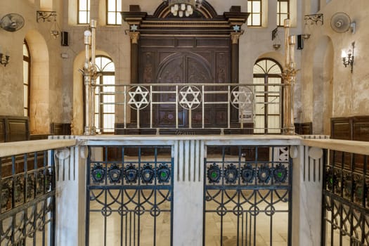 Altar of historic Jewish Maimonides Synagogue or Rav Moshe Synagogue with wooden entrance at the far end, Gamalia district, Cairo, Egypt