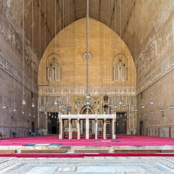 Cairo, Egypt- September 25 2021: monumental main Iwan of Mamluk era historical public Mosque and Madrasa of Sultan Hassan, Old Cairo