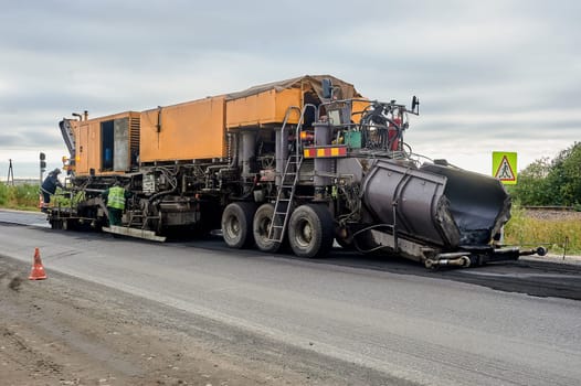 road repair, asphalt laying, asphalt replacement. High quality photo