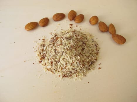 Almond flour, ground almonds on a wooden board