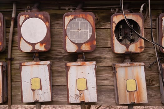 Electrical boxes exposed outside rust away going unused