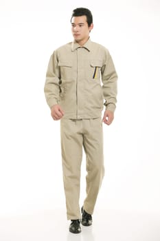 The young engineer various occupation clothing standing in front of a white background