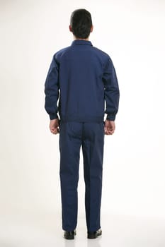 The young engineer various occupation clothing standing in front of a white background