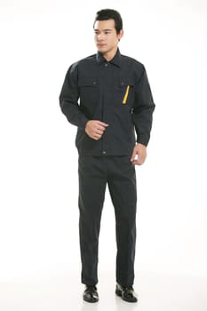 The young engineer various occupation clothing standing in front of a white background